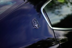 Maserati, logo, car brand — 10 Book-to-Movie Adaptations That Did Justice to the Original Story